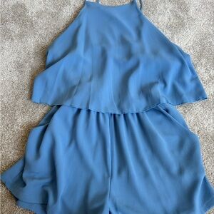 Chic Blue Sleeveless Romper with pockets